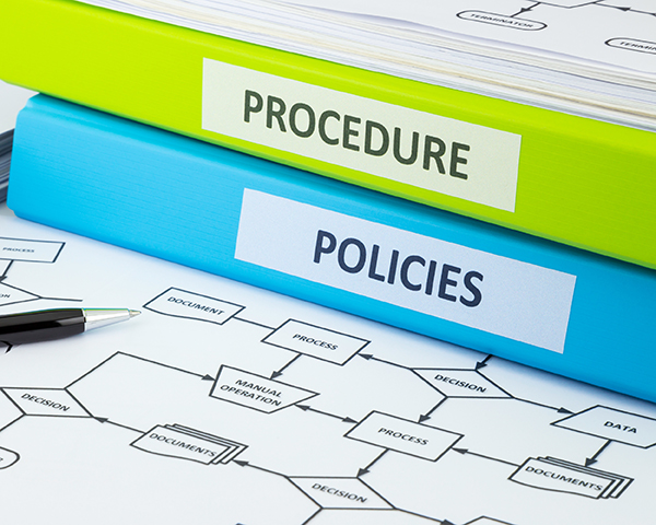 Professionals in a corporate setting brainstorming on innovative restructuring solutions to optimize business processes.